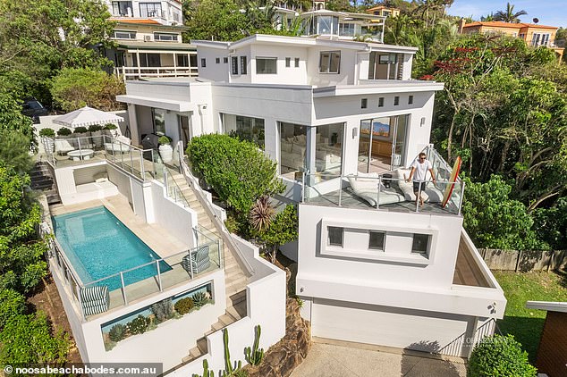 The five-bedroom, five-bathroom holiday home, called Villa Isabelle, is perched on a cliff overlooking the popular coastline in south-east Queensland