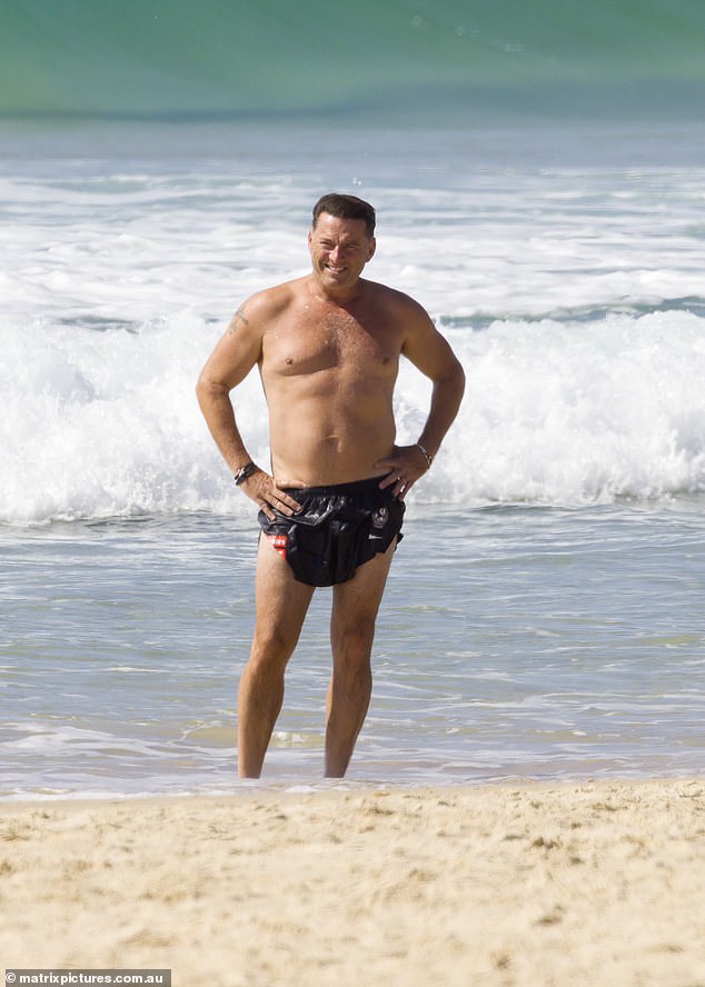 Karl was all smiles in September as he went off air to show off his physique at nearby Noosa beach