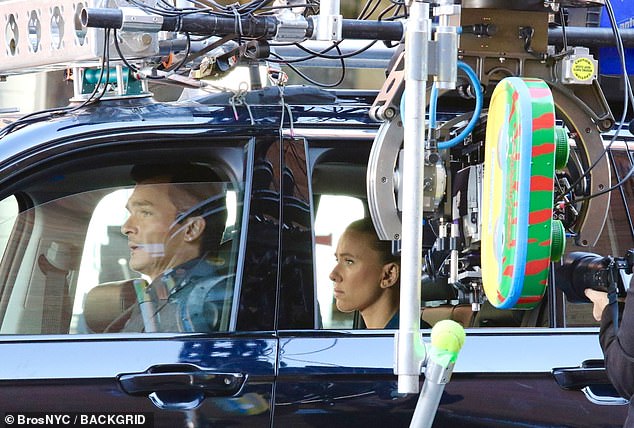 Johansson got into the backseat of the SUV at the scene, while Friend acted as driver