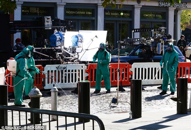 The set took place in front of the Shake Shack restaurant and featured a group of at least four people in hazmat suits touching the area and spraying some type of liquid in an area that resembled sand.