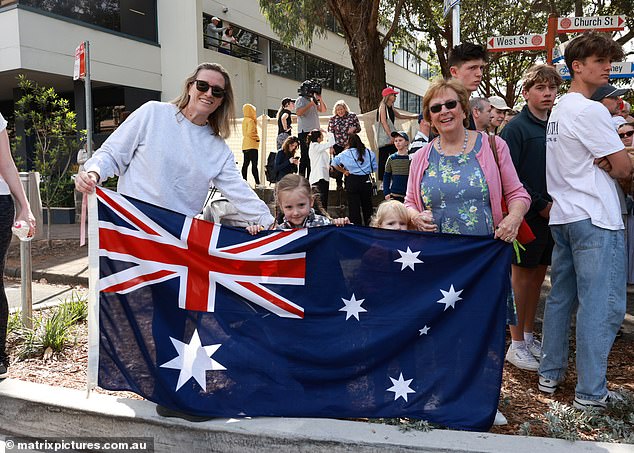 Aussies formed a crowd outside the church on Sunday to greet King Charles and Queen Camilla