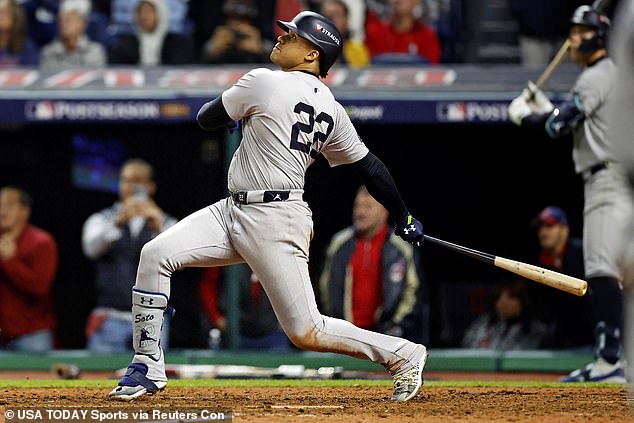 Juan Soto watches as his tenth inning home run flies out of the park to take a 5-2 lead