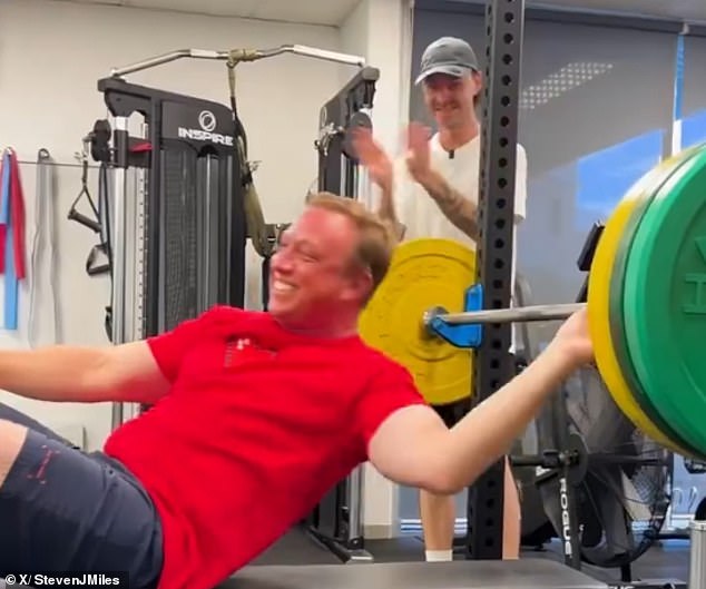 Mr Miles posted a video of himself lifting the weight on Sunday afternoon