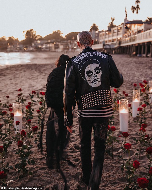 The couple is seen on the beach at the Miramar Beach Hotel