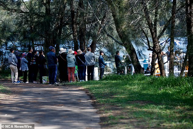 The local Vietnamese community has rallied behind the bereaved father after the horrific tragedy