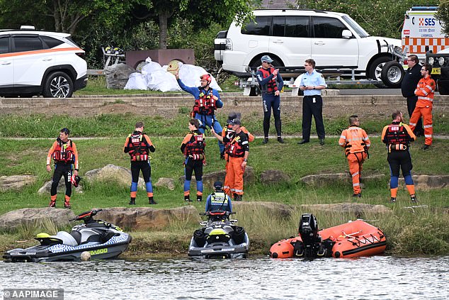 Emergency services rushed to the boat ramp at Shearer Park off Hollywood Drive, Lansvale, on the Georges River after reports of a woman and two children in the water 'in distress'