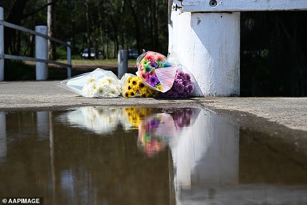 Flowers were left at the boat ramp near where the mother and her two children were first seen in the water