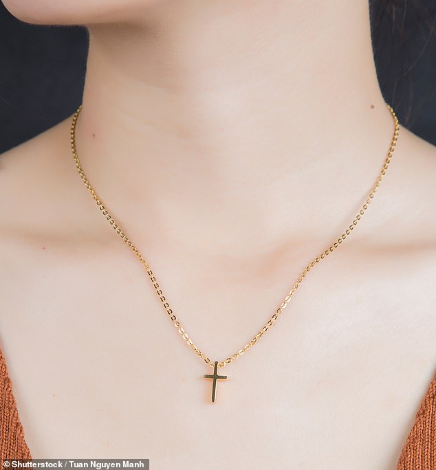 An unnamed student claims that girls were told to take off their cross necklaces because they offended other students