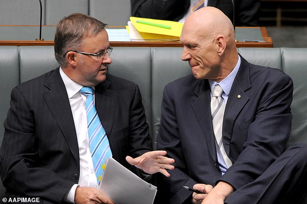 Mr Albanese and Midnight Oil frontman Peter Garrett (pictured right) were ministerial colleagues during the Rudd and Gillard Labor governments