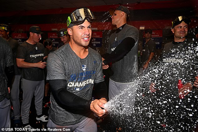 The Yankees took the party to the clubhouse where they had the champagne sprayed