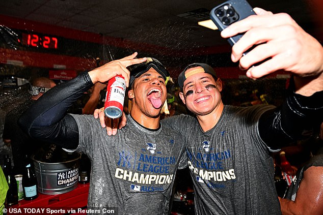 Juan Soto (left) and Anthony Rizzo (right) pose for a selfie in their commemorative t-shirts