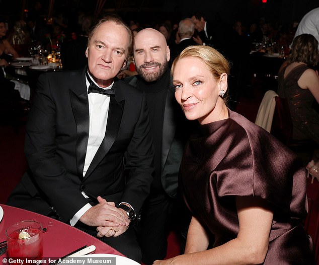 Travolta looked dapper in a black suit jacket paired with a high-neck sweater for the evening, while Tarantino wore a tuxedo.