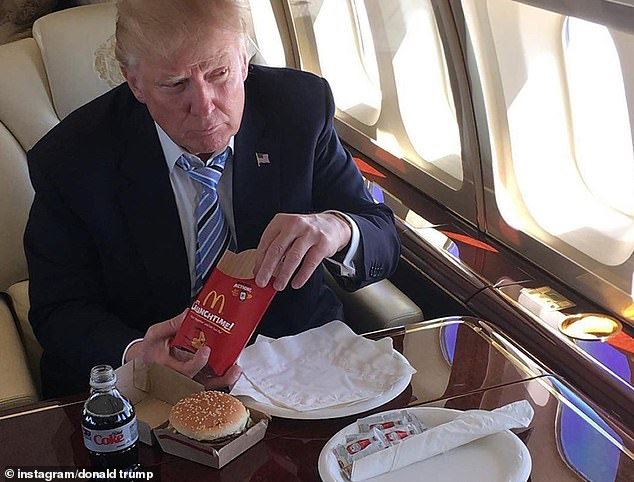 Donald Trump eating McDonald's on his plane. It appears he ordered a Big Mac, a large french fries and a Diet Coke