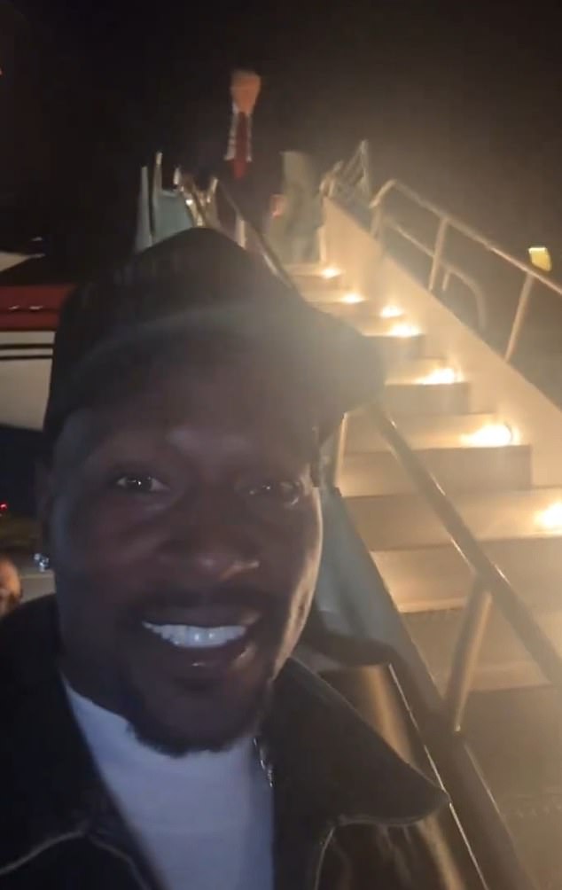 Trump was bizarrely greeted on the tarmac by ex-NFL star Antonio Brown after he landed