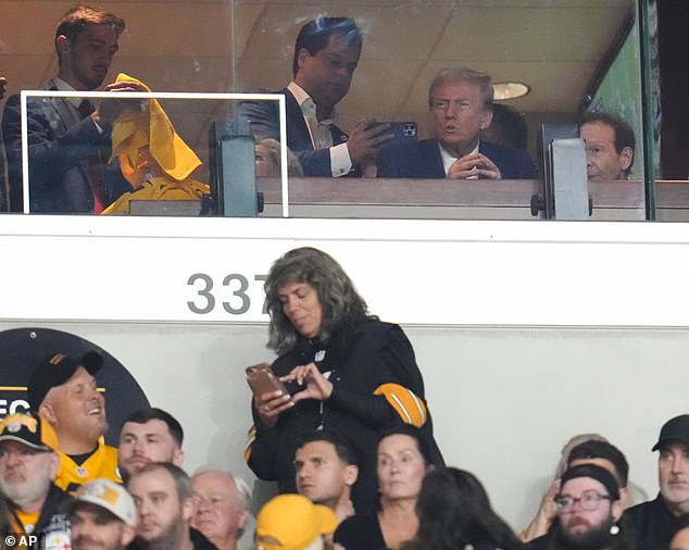 Trump could be seen watching the game intently from a private suite in the stadium