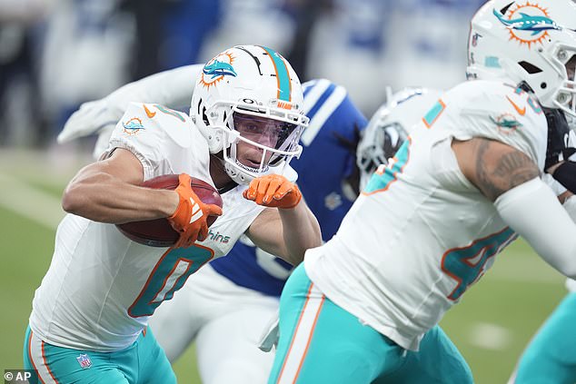 Dolphins wide receiver Braxton Berrios runs for yardage during the first half on Sunday