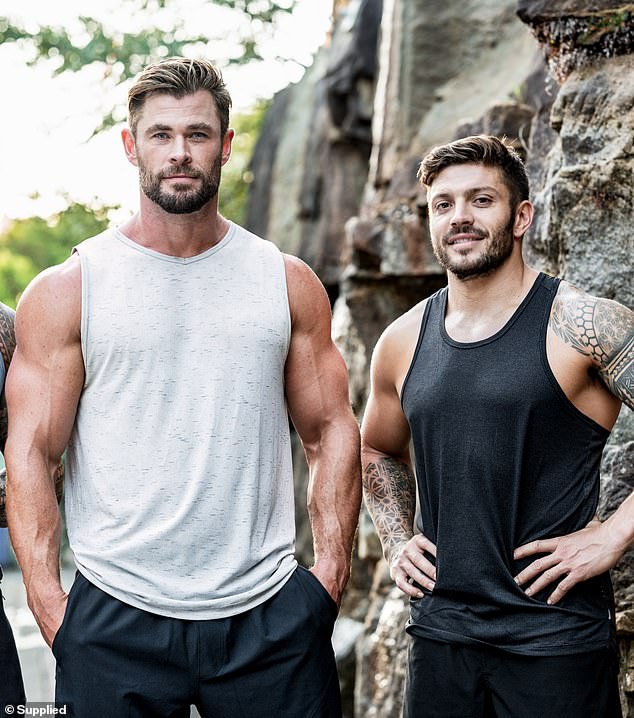 Groom Luke (right), who has been by Hollywood star Chris's side since they were six, has been the man behind the construction of Thor's body for more than twelve years. Pictured with Chris