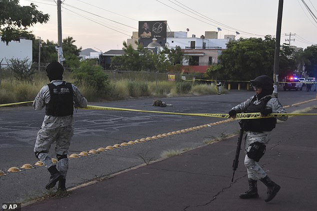 The National Guard is closing off an area where a body was found on a street in Culiacán this month