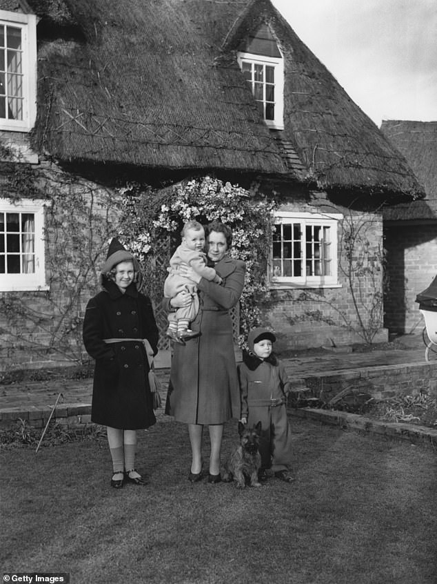 Raine (left) pictured with her mother, Barbara Cartland, and two brothers Ian (right) and Glen (center) in 1940