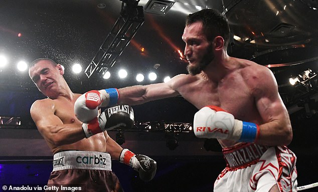 Bakhram Murtazaliev (right) defeated the Australian boxer over three rounds to retain his IBF super welterweight belts