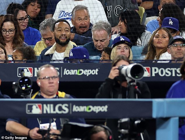 The pair watched from the stands during Game Six of the National League Championship Series between the New York Mets and Los Angeles Dodgers at Dodger Stadium.