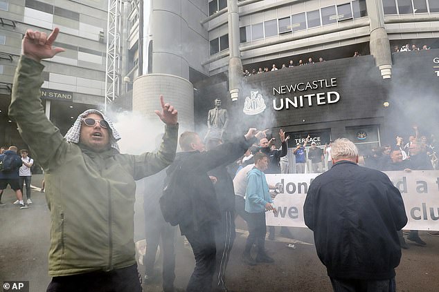 Fans gathered to celebrate outside St James' Park in 2021 as the takeover was confirmed