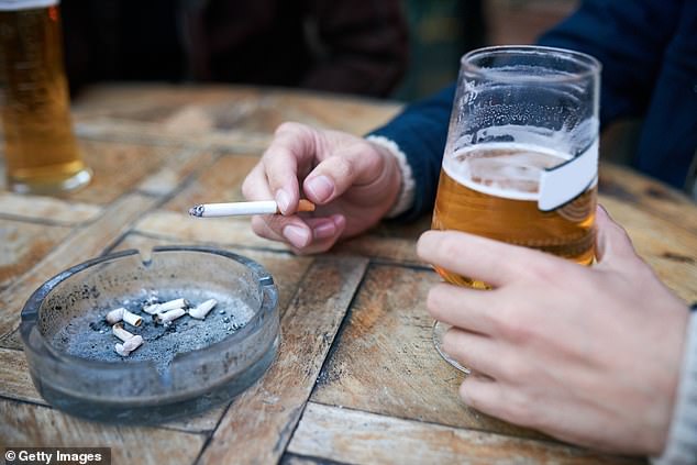 White people in Britain are more likely to die than ethnic minorities because of their drinking and smoking habits (file image)