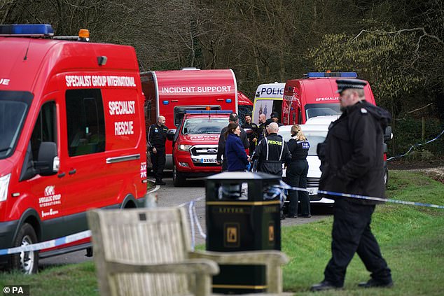 Police at the scene in Gravelly Hill in Caterham, Surrey, where Mrs Johnston was attacked