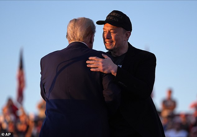 Tesla CEO Elon Musk (R) joins former US President and Republican presidential candidate Donald Trump at a campaign rally at the site of his first assassination attempt in Butler, Pennsylvania