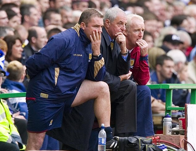 McCoist coached Scotland alongside Tommy Burns (right) and manager Walter Smith (centre)