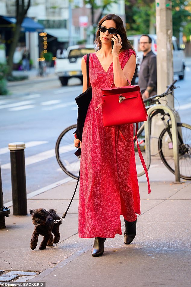 Irina was the epitome of effortless fashion with her flowing red dress, chunky boots and matching Hermes bag on her arm