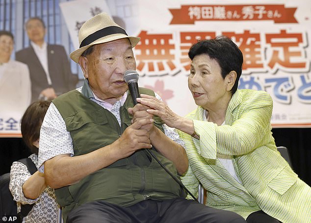 Former Japanese death row inmate Iwao Hakamada (left) and his sister Hideko Hakamada attend a rally of supporters on October 14, 2024 in Shizuoka, central Japan