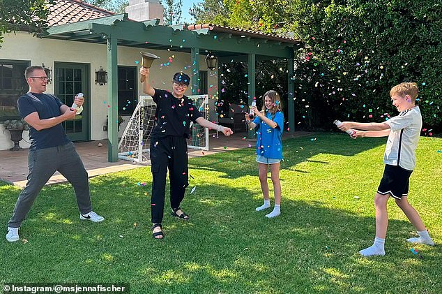 Jenna shared a photo with husband Lee Kirk and their children as they celebrated the end of her treatment