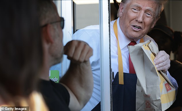 Trump smiled as he worked the drive-through line during his visit to a McDonald's restaurant in Feasterville-Trevose, Pennsylvania on October 20, 2024