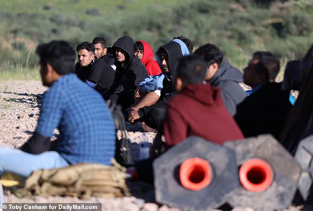 Migrants from Nepal, India and Bangladesh are waiting for a ride from Border Patrol after illegally entering the US