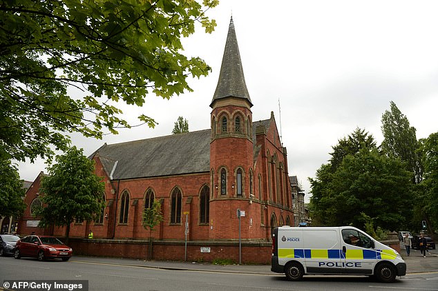 A police van passes the Didsbury Mosque in Didsbury, Manchester, North West England, on May 24, 2017