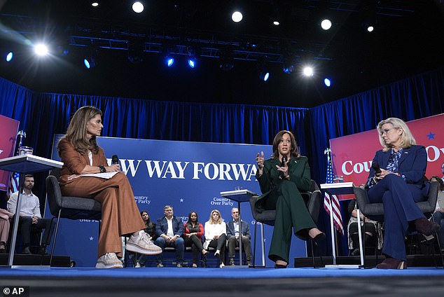 Democratic presidential candidate Vice President Kamala Harris speaks as moderator Maria Shriver (left) and former Republican Congresswoman Liz Cheney listen during a town hall