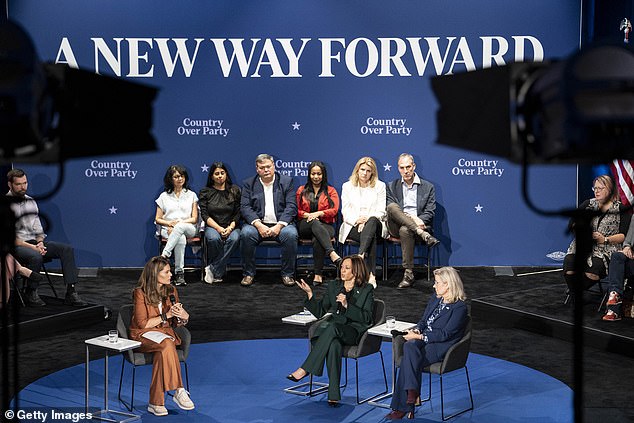 Democratic presidential candidate Harris sits with former U.S. Rep. Liz Cheney for a town hall with Maria Shriver at the Royal Oak Music Theater in Royal Oak, Michigan