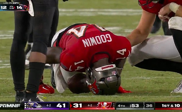 The wide receiver was left in obvious pain as his distraught teammates surrounded him