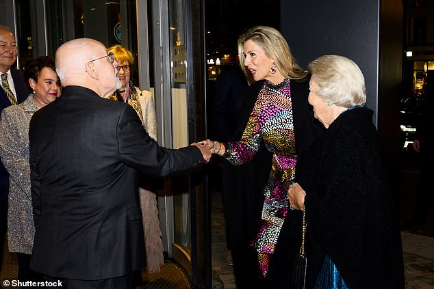 Máxima seemed particularly animated as she greeted Ton Koopman (right), who would celebrate the Dutch royal family in Utrecht