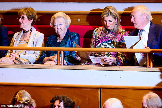 The Dutch royal family, 53, seemed absorbed in the anniversary concert program