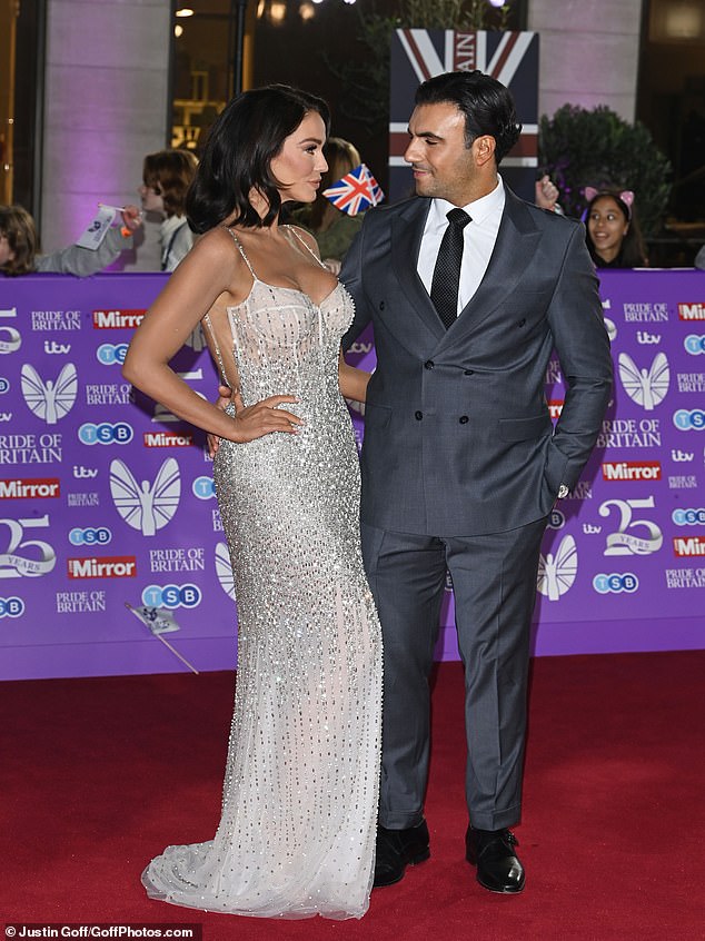 The duo put on a loving show as they posed for photos on the red carpet before entering the star-studded event