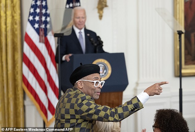 Spike Lee gestures as US President Joe Biden speaks during the National Arts and Humanities Reception on October 21