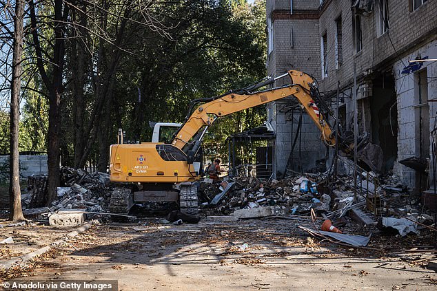 Heavy construction equipment is used to remove rubble after a double attack by Russian forces on a hospital in Sumy, Ukraine on September 28, 2024