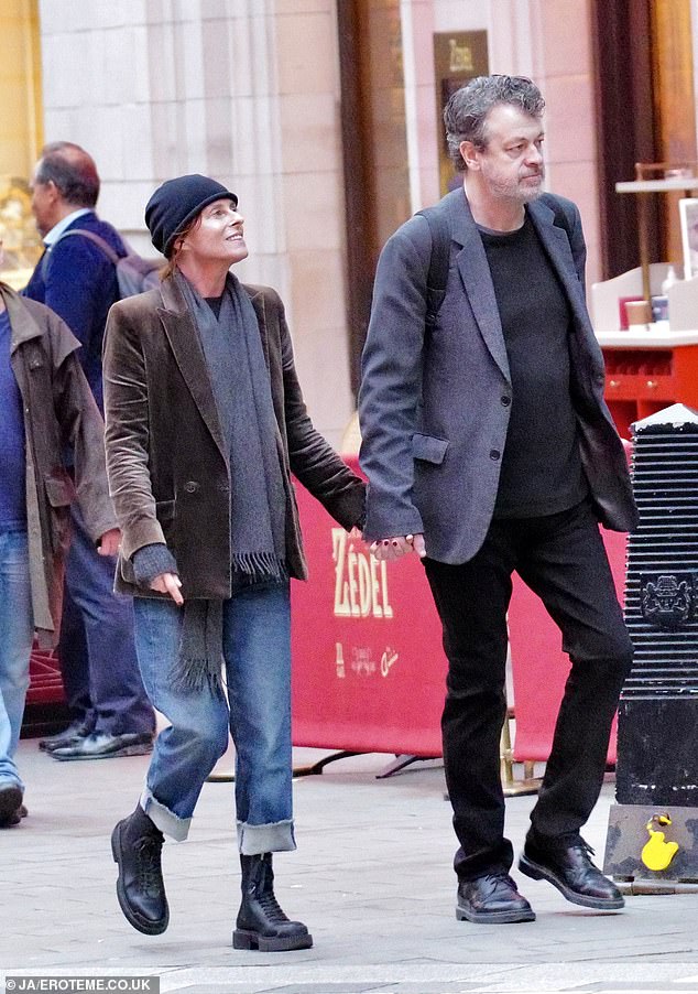 The iconic Mancunian singer looked unrecognizable as she shopped with her husband, Ian Devaney, on London's Regent Street.