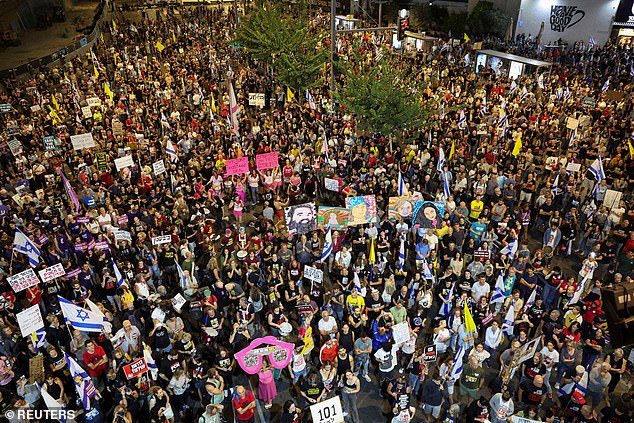 People protest against the government, demanding a ceasefire and the immediate release of hostages kidnapped during the deadly Hamas attack on October 7, 2023 in Tel Aviv, Israel