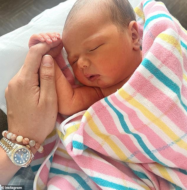 She shared two photos of her son, one of the sleeping child wrapped in blankets, and another of herself cradling him. In the caption of the images, she wrote: “Introducing Christian Jon. October 18, 2024.' In the photo: baby Christian