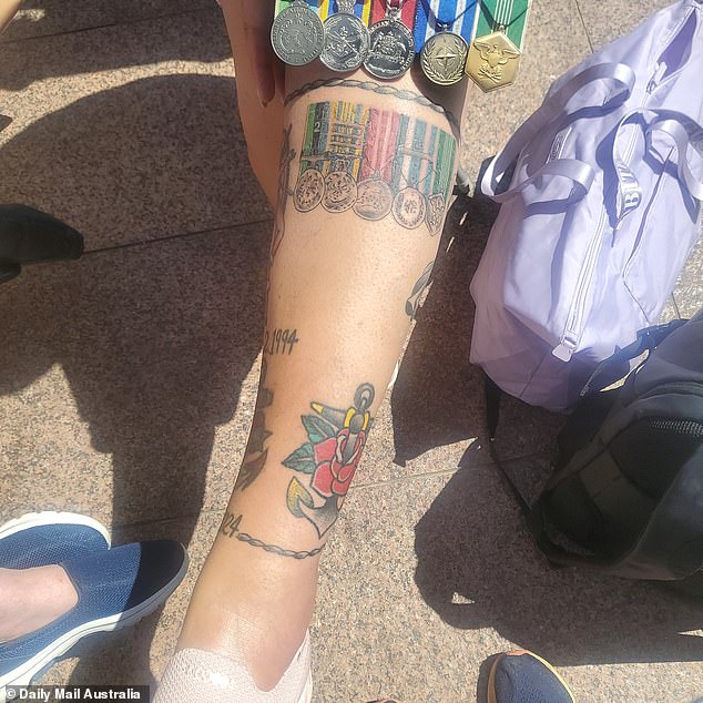 Since medically retiring from military service, Cath recently had her medals tattooed on her leg, along with the dates of her naval career