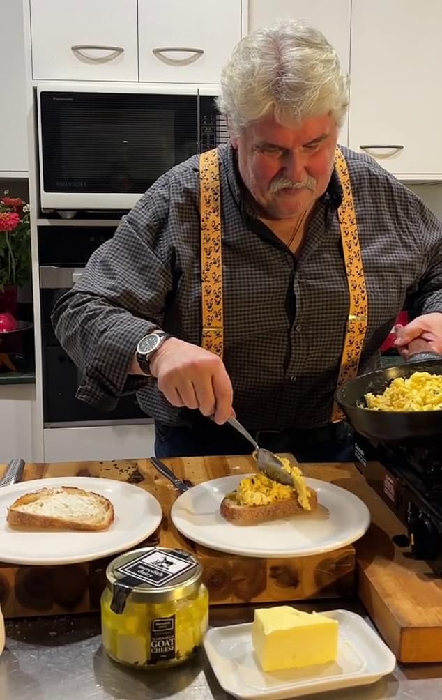 To plate the eggs, the chef spreads some bread and spreads goat cheese on top