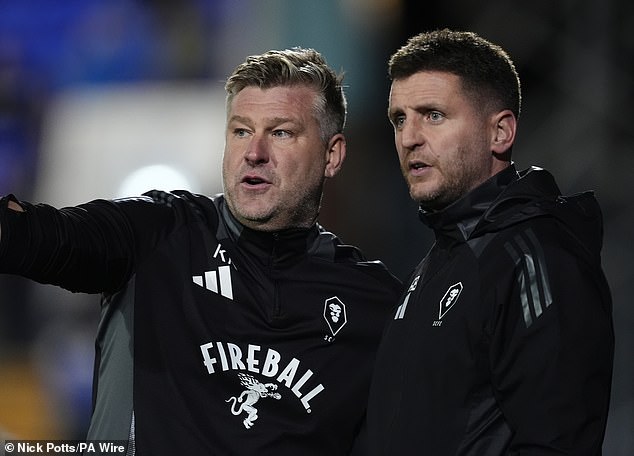 Karl Robinson's team (left) has made a slow start to the new season and is in 18th place after eleven games